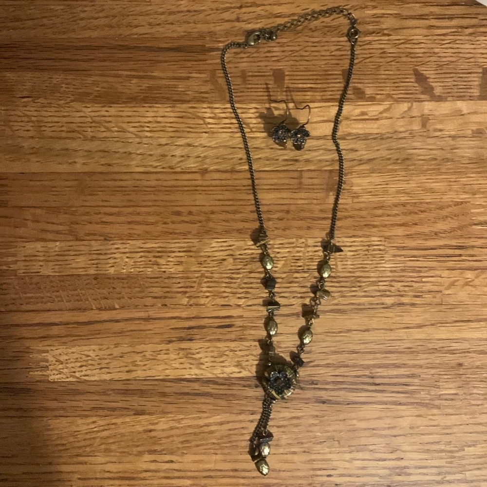 Necklace and earrings. Brown with flower and stones